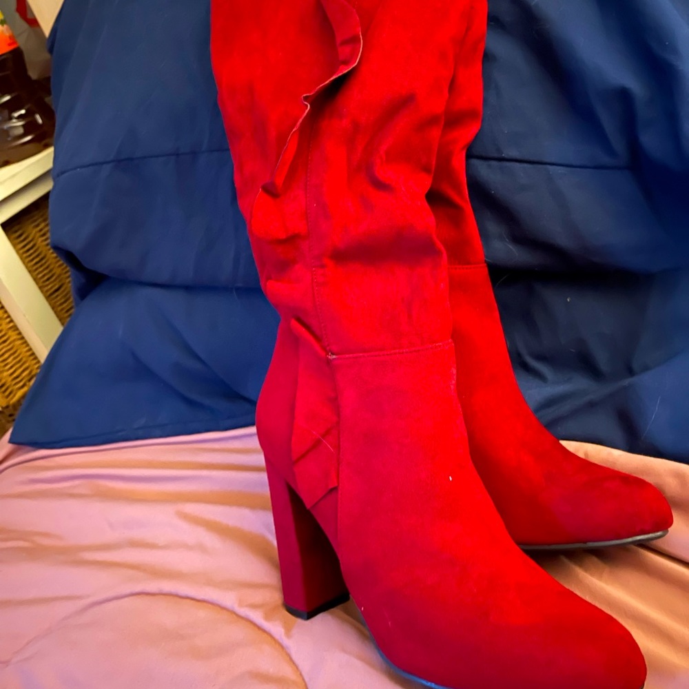Red heeled boots with ruffle